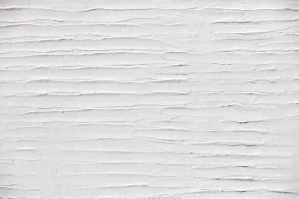 istock White wavy plastered empty wall background, texture. Greece Cyclades island decoration. Copy space 1496131795