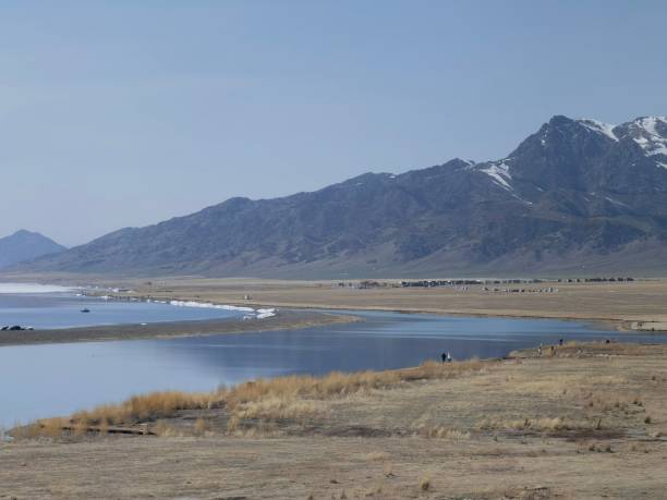 istock Scenic view of a tranquil lake surrounded by mountains 1496131832