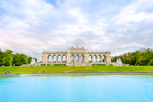 Vienna, Austria - May 10, 2023: Sunset landscape of the Gloriette at the top of the hill in Schonbrunn Garden