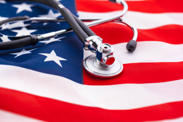 istock Stethoscope on American national flag, close up 1496131948