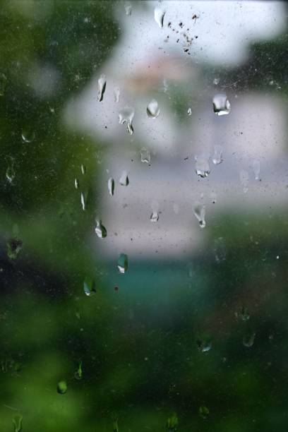 istock Window glass covered with rain droplets 1496132771