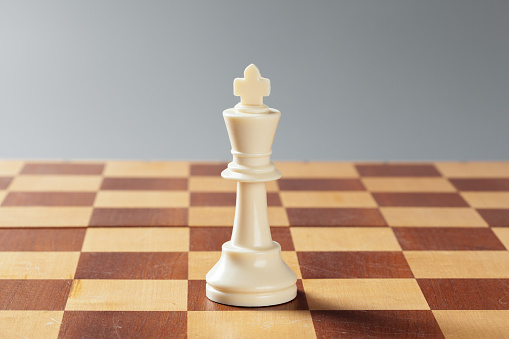 Chess board made of marble with wooden chess pieces