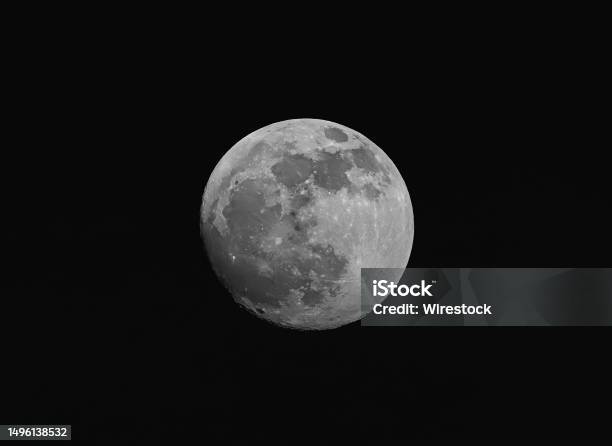Full Moon Is Illuminated In Night Sky Stock Photo - Download Image Now - Awe, Black And White, Bright
