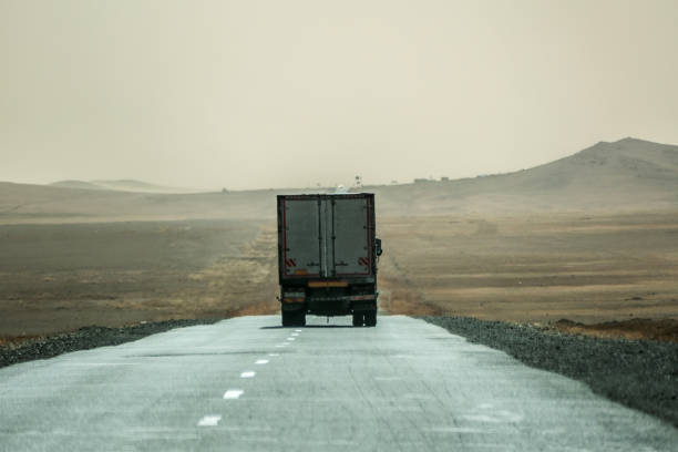 istock Truck on Highway road in Central Mongolia 1496139171