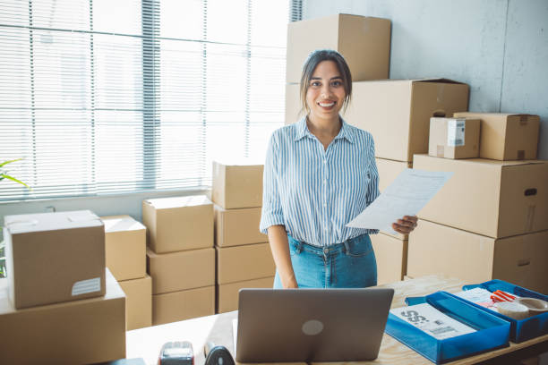 istock Female entrepreneur in e-commerce shop 1496142915