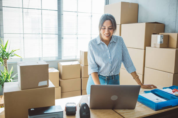 istock Female entrepreneur in e-commerce shop 1496142922