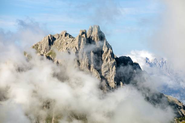 istock Dolomites mountains in the middle of Clouds 1496142927