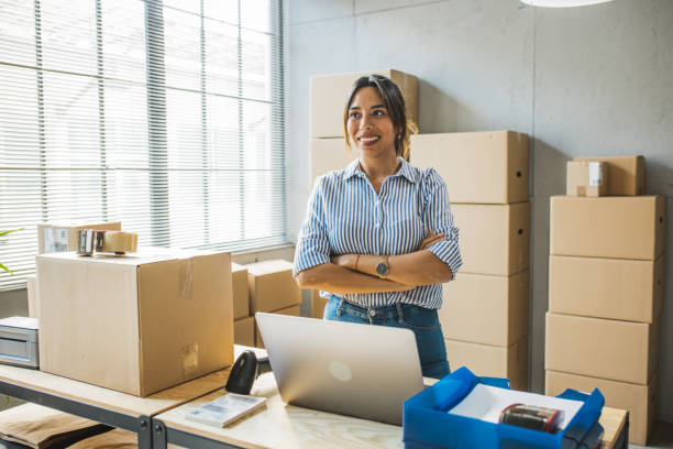 istock Female entrepreneur in e-commerce shop 1496143181