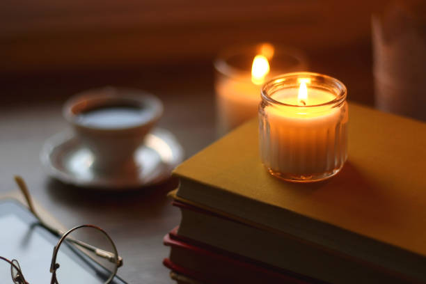 istock Books, Glasses, E-Reader, Pen, Tea, Cookies and Candles 1496144396