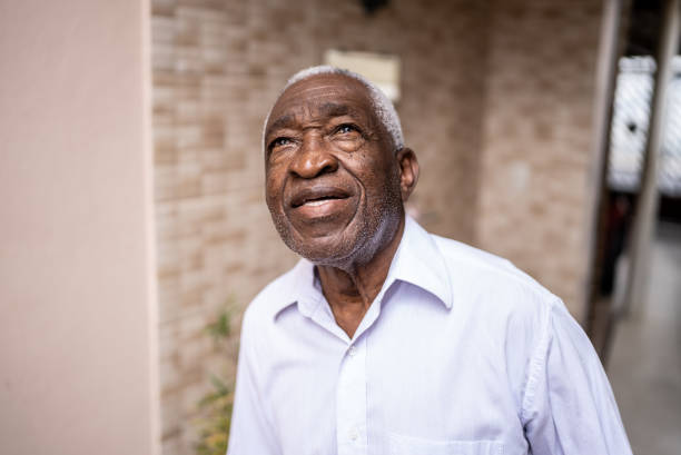 istock Senior man looking away contemplating outdoors 1496144982