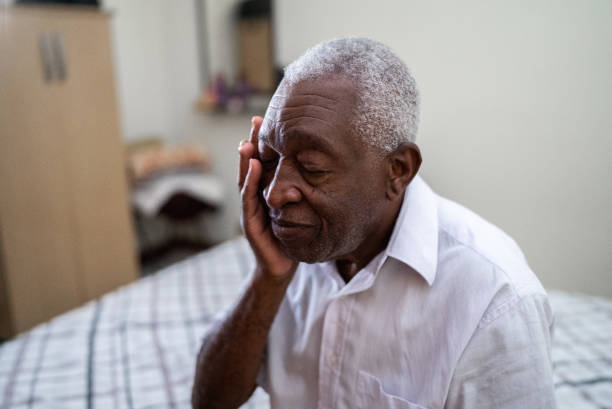 istock Worried senior man feeling bad at home 1496145176
