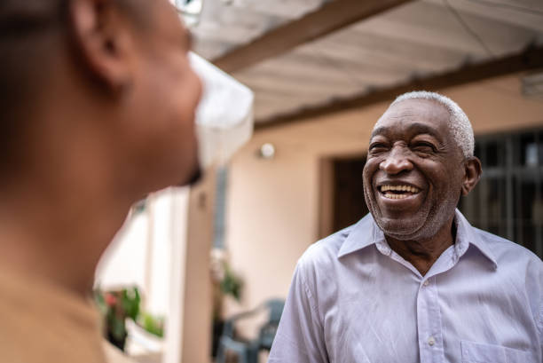 istock Father and son talking in the backyard at home 1496145458
