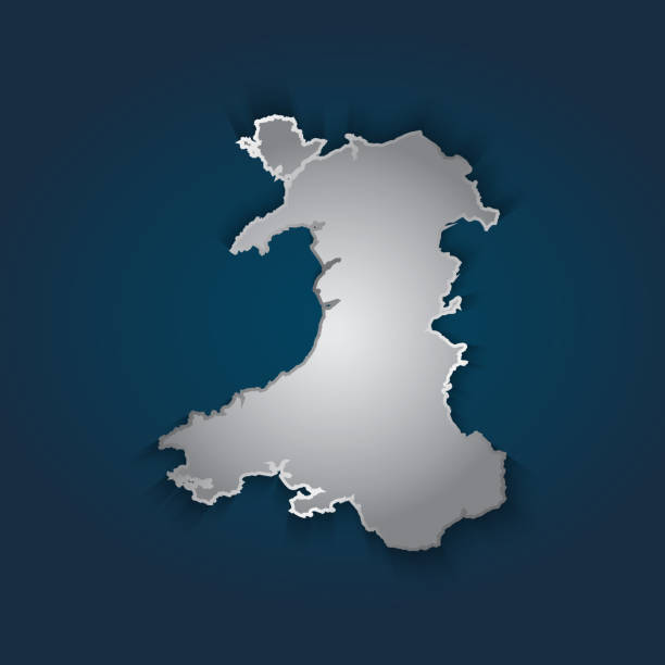 карта уэльса серебристый металлик с хромом, градиент блеска на темно-синем фоне. - wales cardiff map welsh flag stock illustrations