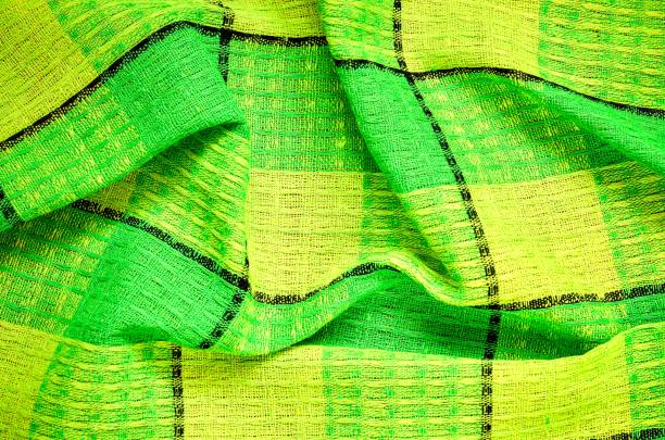 pano de material de textura enrugada. - lime green pleated pattern green - fotografias e filmes do acervo