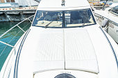 View of the bow of a snow-white yacht, an area for recreation, leisure, tourism and travel by sea.