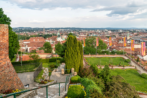 Marvel at the captivating cityscape of Graz, Austria, where the past seamlessly blends with modernity. This panoramic view showcases the architectural beauty and vibrant atmosphere of this European gem. The skyline of Graz is adorned with a mix of historic and modern buildings, creating a visual feast for the eyes.