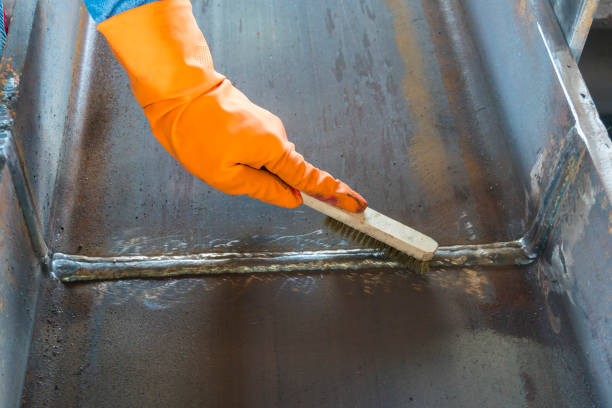 istock Use a brush to clean the welding surface 1496154053