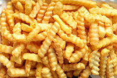 Close up large group of french fries background