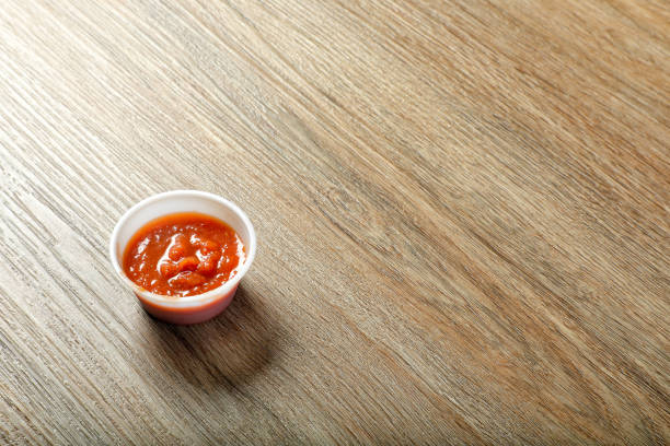 Close up sauce in small container