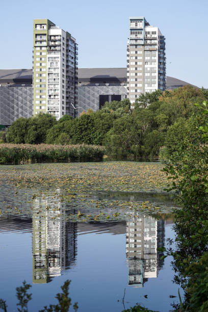 istock The front of the modern buildings by lake 1496161302