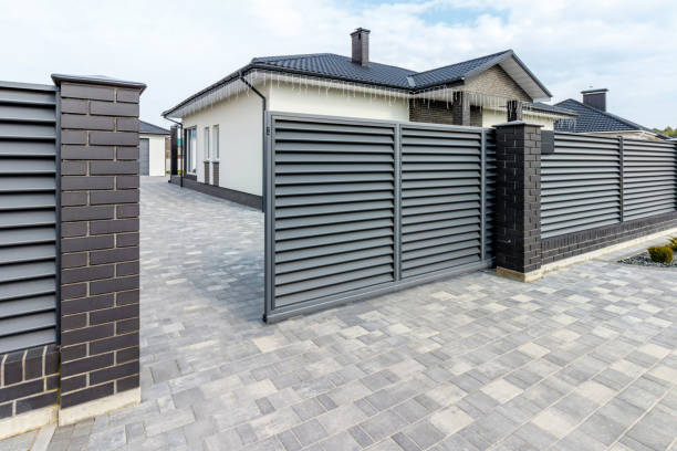 istock Fragment of a modern fence lined with decorative bricks in the old style 1496161693