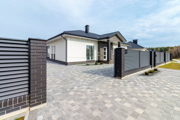 istock Fragment of a modern fence lined with decorative bricks in the old style 1496161776