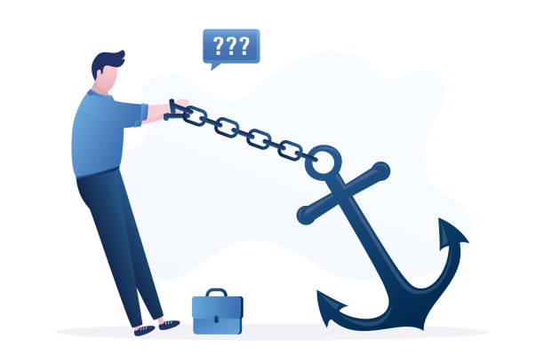 istock Businessman is chained to a large anchor. Severe insurmountable circumstances hinder business person. Mental problems, credit debt. Business troubles. 1496162833
