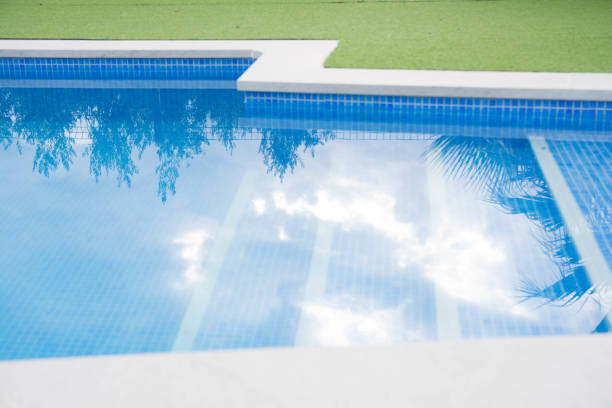 istock Luxury Swimming pool background in summer. Copy space. 1496163014