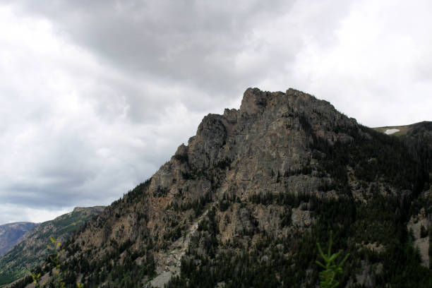 istock Dark Clouds Over Large Mountain in Red Lodge Montana 1496163319