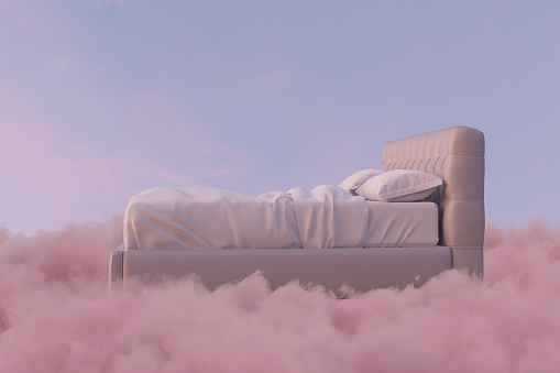 3D rendering of cozy bed over fluffy clouds at night