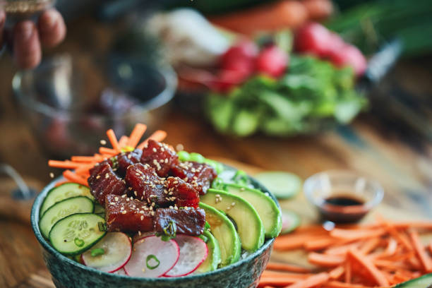 istock Ahi Tuna with Cucumber, Radish, Carrots and Avocado 1496178231