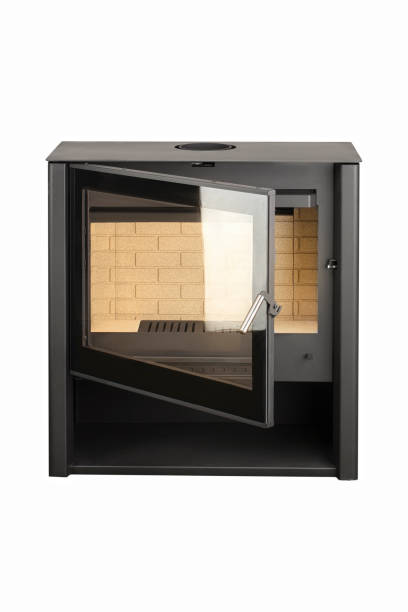 istock Modern fireplaces for heating from metal and heat-resistant glass. Boiler for solid fuel isolated on white background. 1496178331