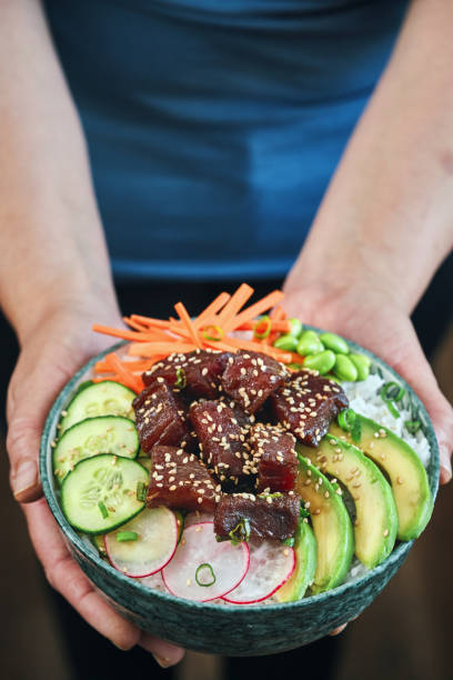 istock Ahi Tuna with Cucumber, Radish, Carrots and Avocado 1496178359