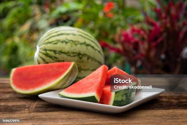 Watermelon Slice In The Summer Stock Photo - Download Image Now - Watermelon, Plate, Slice of Food
