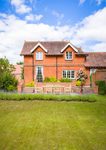 Old farm outbulding converted into luxurious countryside home within charming landscaped gardens