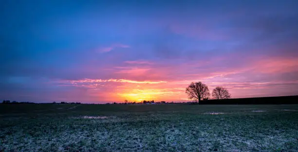 Flat land and big skies, some of the best sunrises and sunsets in the world can be found on the Fens near Spalding in Lincolnshire in Eastern England.