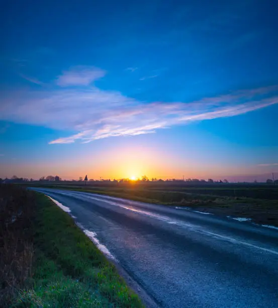 Flat land and big skies, some of the best sunrises and sunsets in the world can be found on the Fens near Spalding in Lincolnshire in Eastern England.