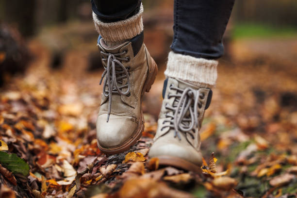 istock Leather hiking boot with alpaca knitted socks 1496184241