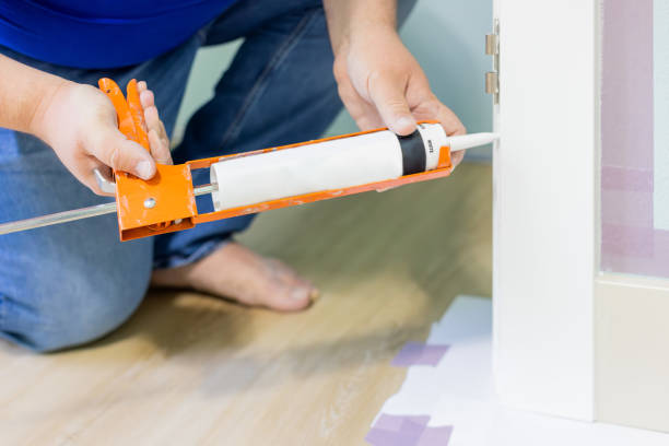 istock A man is caulking door moldings 1496186372