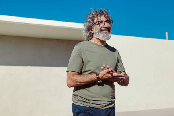 istock Satisfied senior man outdoors 1496189020