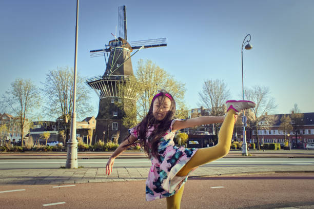 a beautiful girl dancing in front of camera