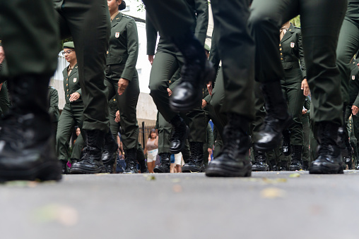 Salvador, Bahia, Brazil - September 07, 2022: View of the boots and legs of soldiers parading on the Brazilian independence day, in Salvador, Bahia.