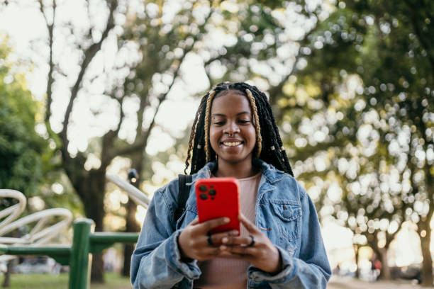 istock Woman on the way using smartphone 1496191931