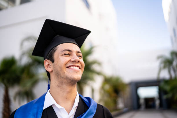 istock Young graduate man contemplating on his graduation 1496192496