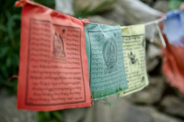 Tibetan flags, Buddhist holy prayers Tibetan flags, Buddhist holy prayers on colorful fabric shingon buddhism stock pictures, royalty-free photos & images