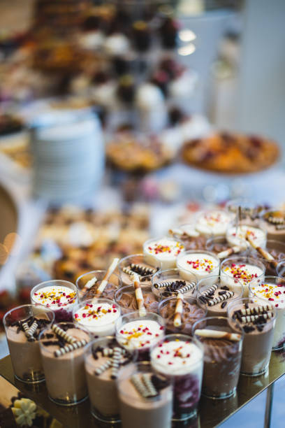 istock Delicious wedding reception candy bar dessert table 1496195239