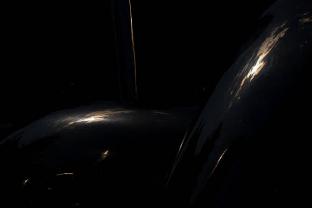 istock Solar chaotic glare on a black background in mirror reflection, rays of light on black 1496195316