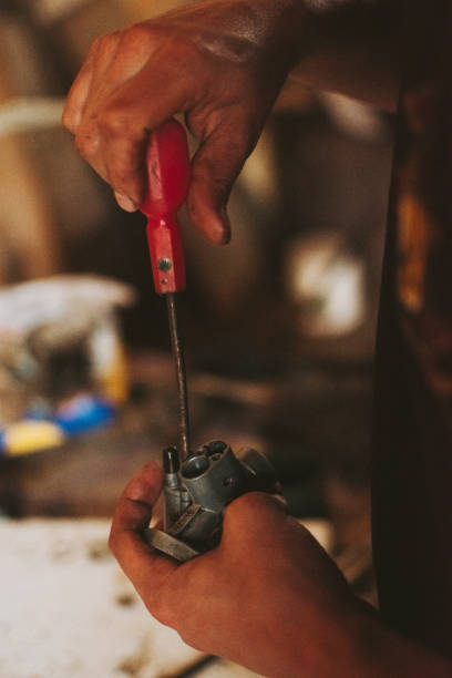 istock Hands of car mechanic 1496195505