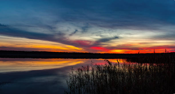 istock Beautiful autumn sunset on the lake. 1496195961