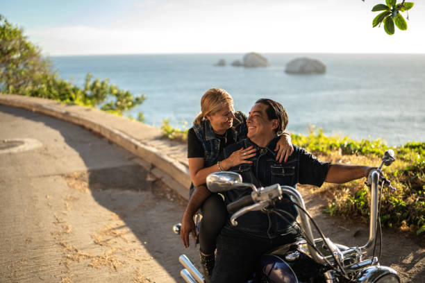 istock Mature couple enjoying a motorcycle road trip 1496199239